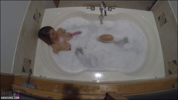 Nikki Sims nikki sims alone bath 02 thumb - Bubble Bath Dildo Masturbation